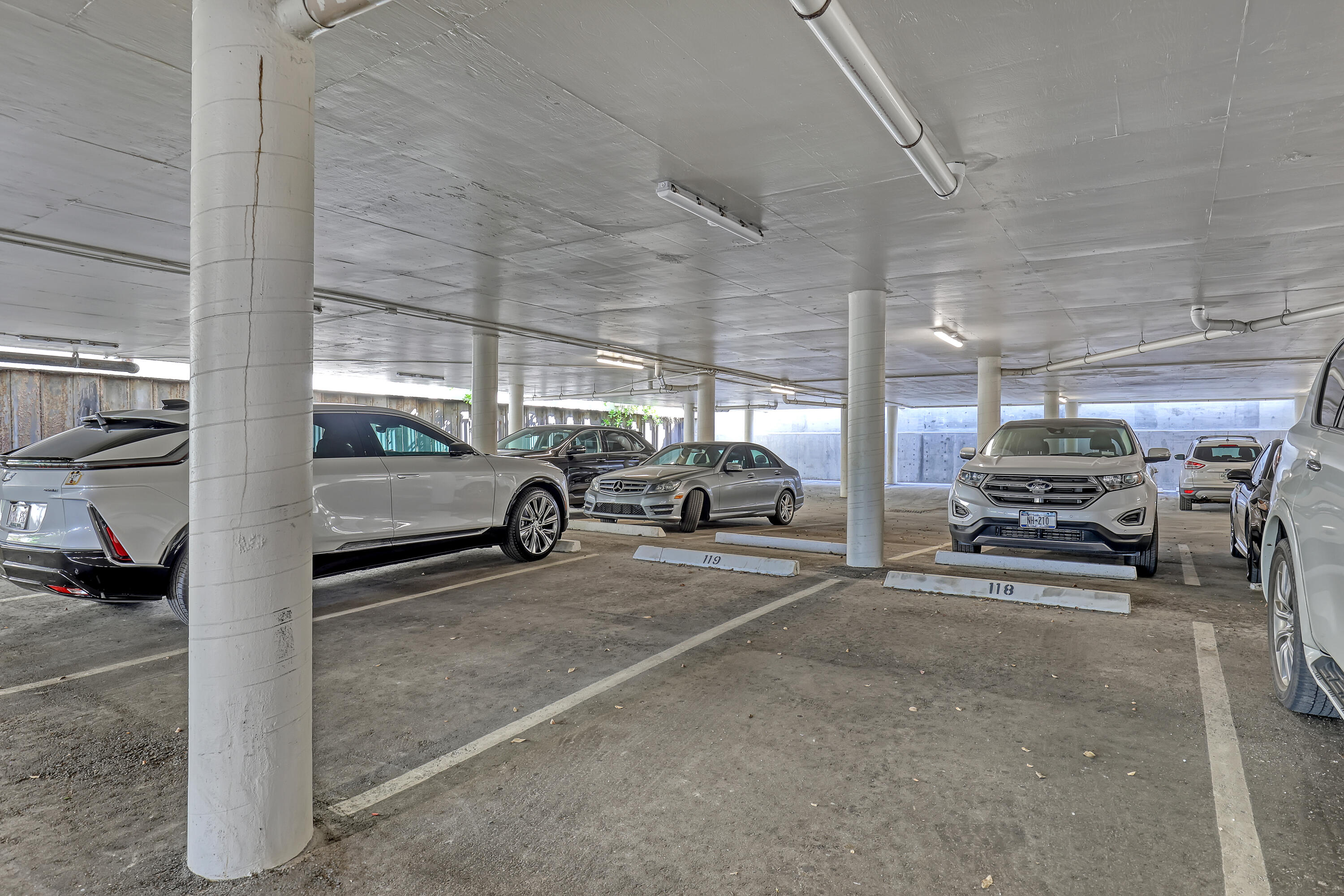 3610 South Ocean Boulevard, Unit 508 South Palm Beach, FL 33480 - Photo 11 of 65 a view of parking garage with cars parked