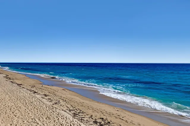 a view of a bathroom with a glass door