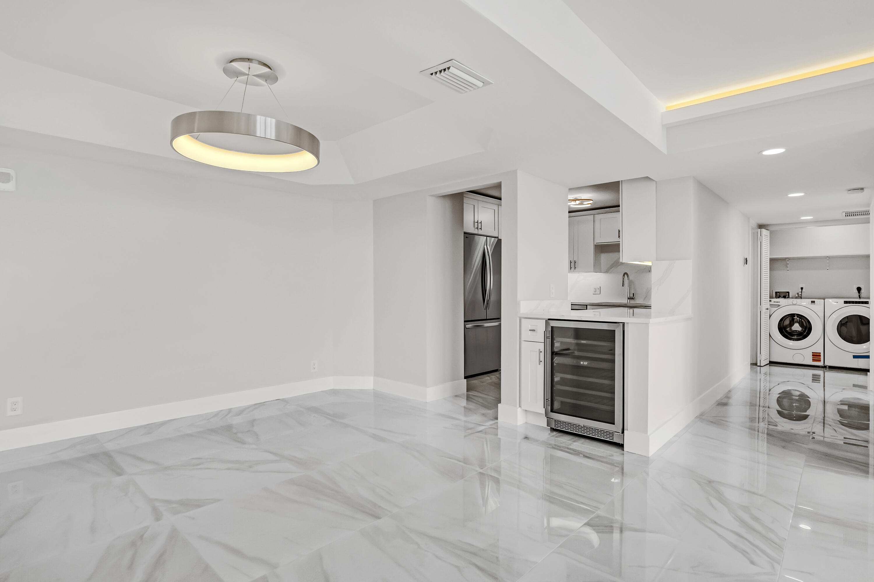 3610 South Ocean Boulevard, Unit 508 South Palm Beach, FL 33480 - Photo 28 of 65 a view of a kitchen with stainless steel appliances a refrigerator and a stove