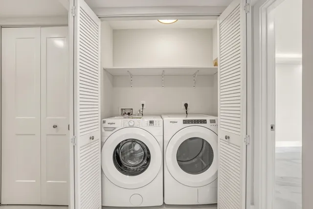 a view of living room window and front door