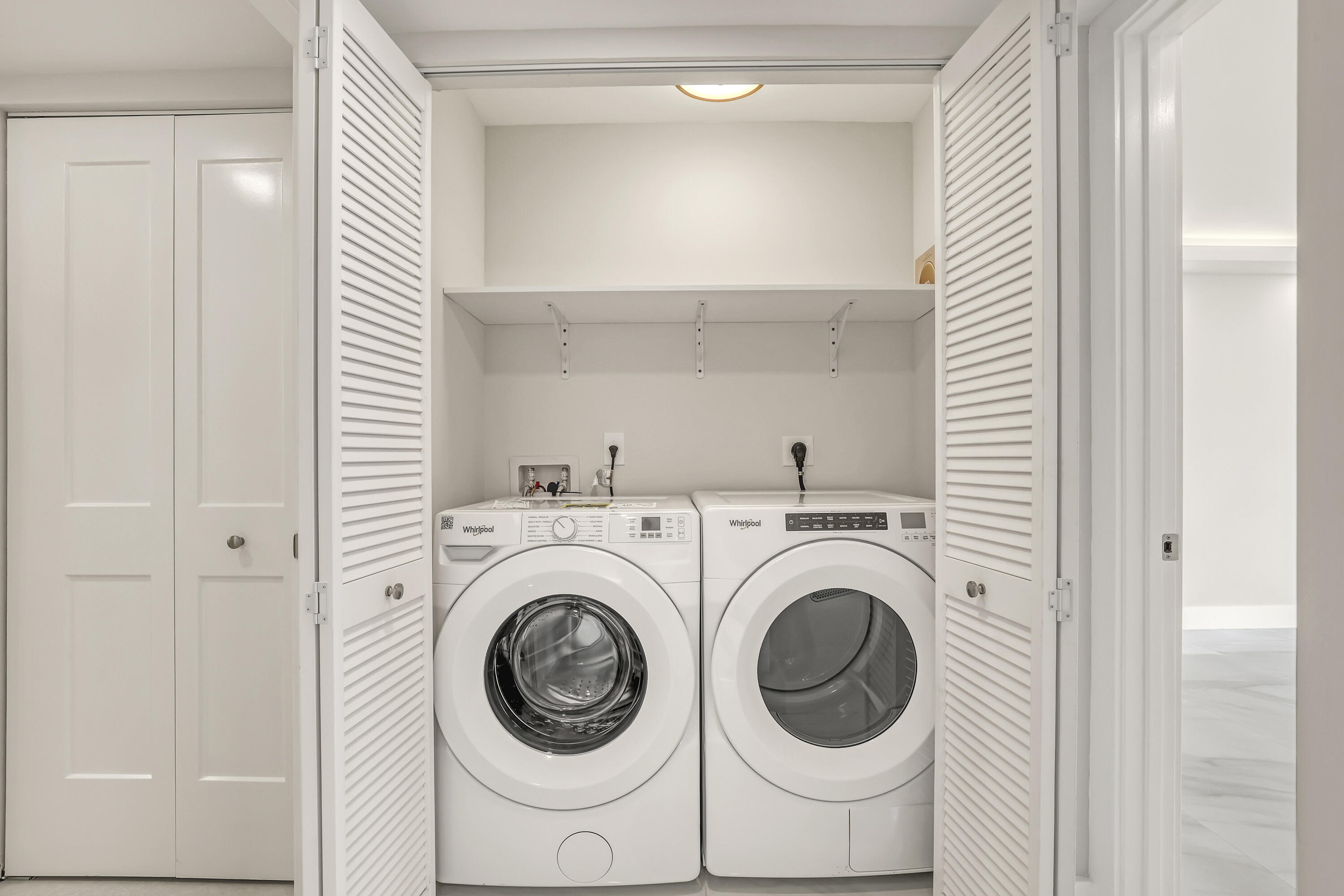 3610 South Ocean Boulevard, Unit 508 South Palm Beach, FL 33480 - Photo 33 of 65 a utility room with dryer and washer