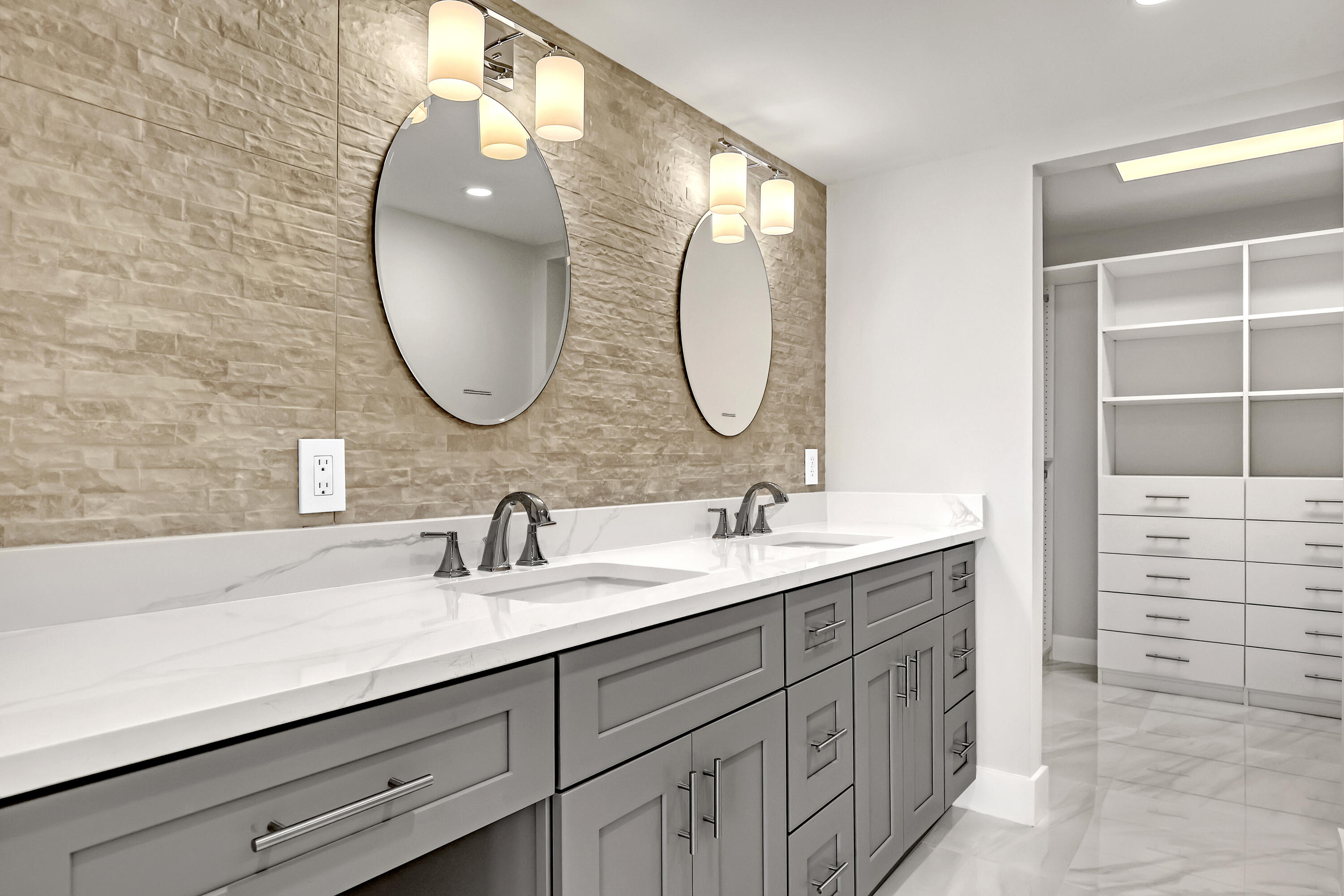 3610 South Ocean Boulevard, Unit 508 South Palm Beach, FL 33480 - Photo 39 of 65 a bathroom with a double vanity sink and a mirror