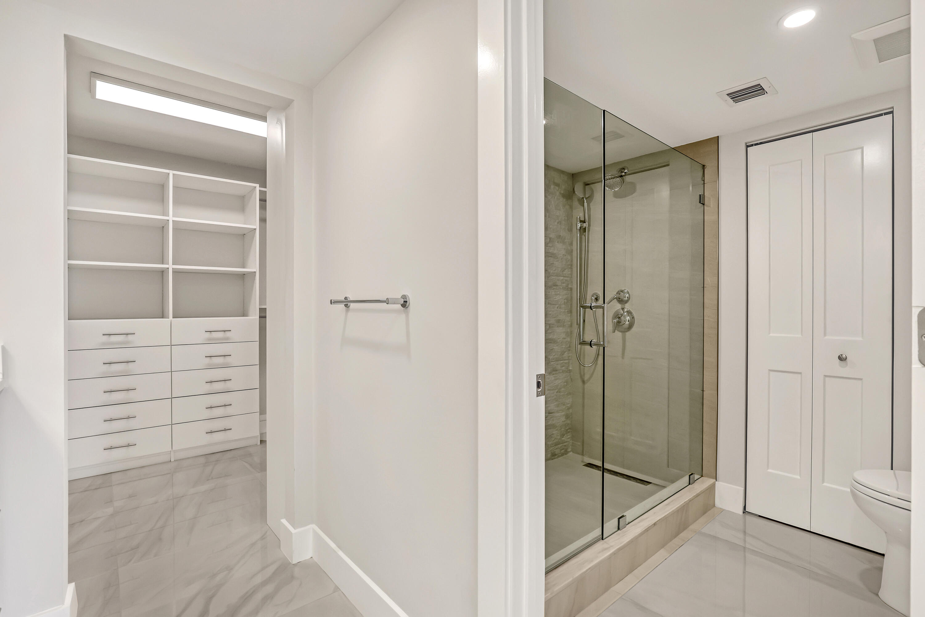 3610 South Ocean Boulevard, Unit 508 South Palm Beach, FL 33480 - Photo 40 of 65 a bathroom with a shower and closet