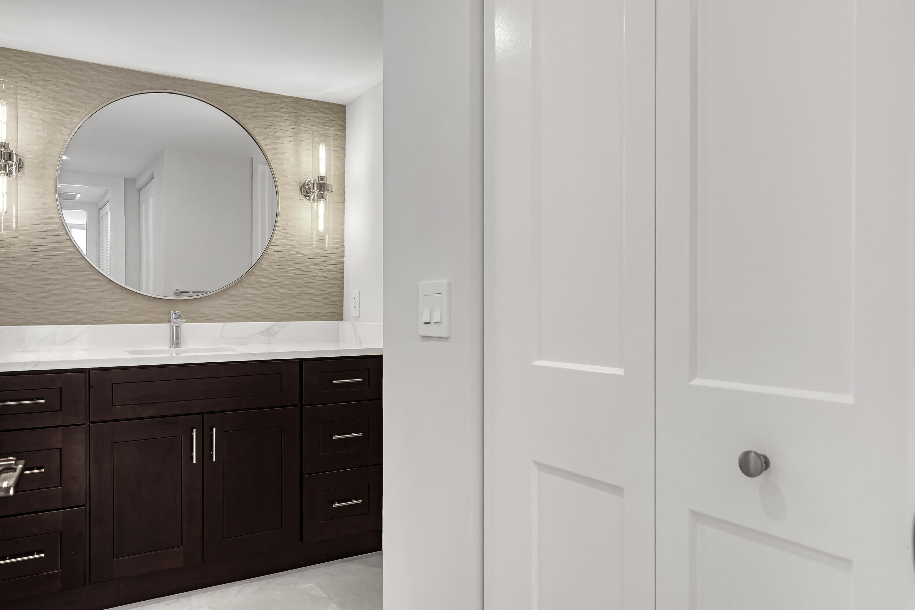 3610 South Ocean Boulevard, Unit 508 South Palm Beach, FL 33480 - Photo 50 of 65 a bathroom with a sink and a mirror