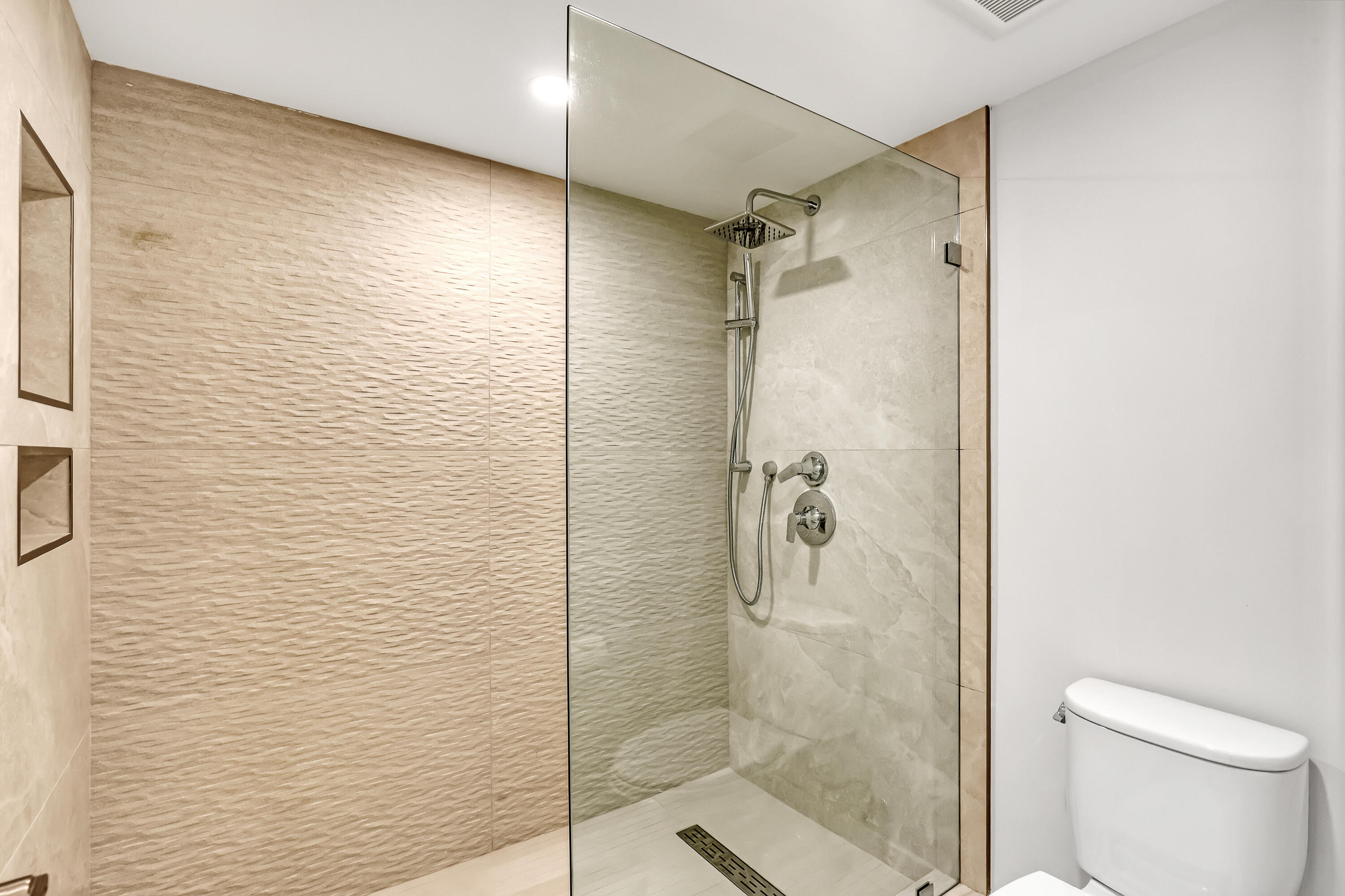 3610 South Ocean Boulevard, Unit 508 South Palm Beach, FL 33480 - Photo 51 of 65 a bathroom with a shower and a toilet