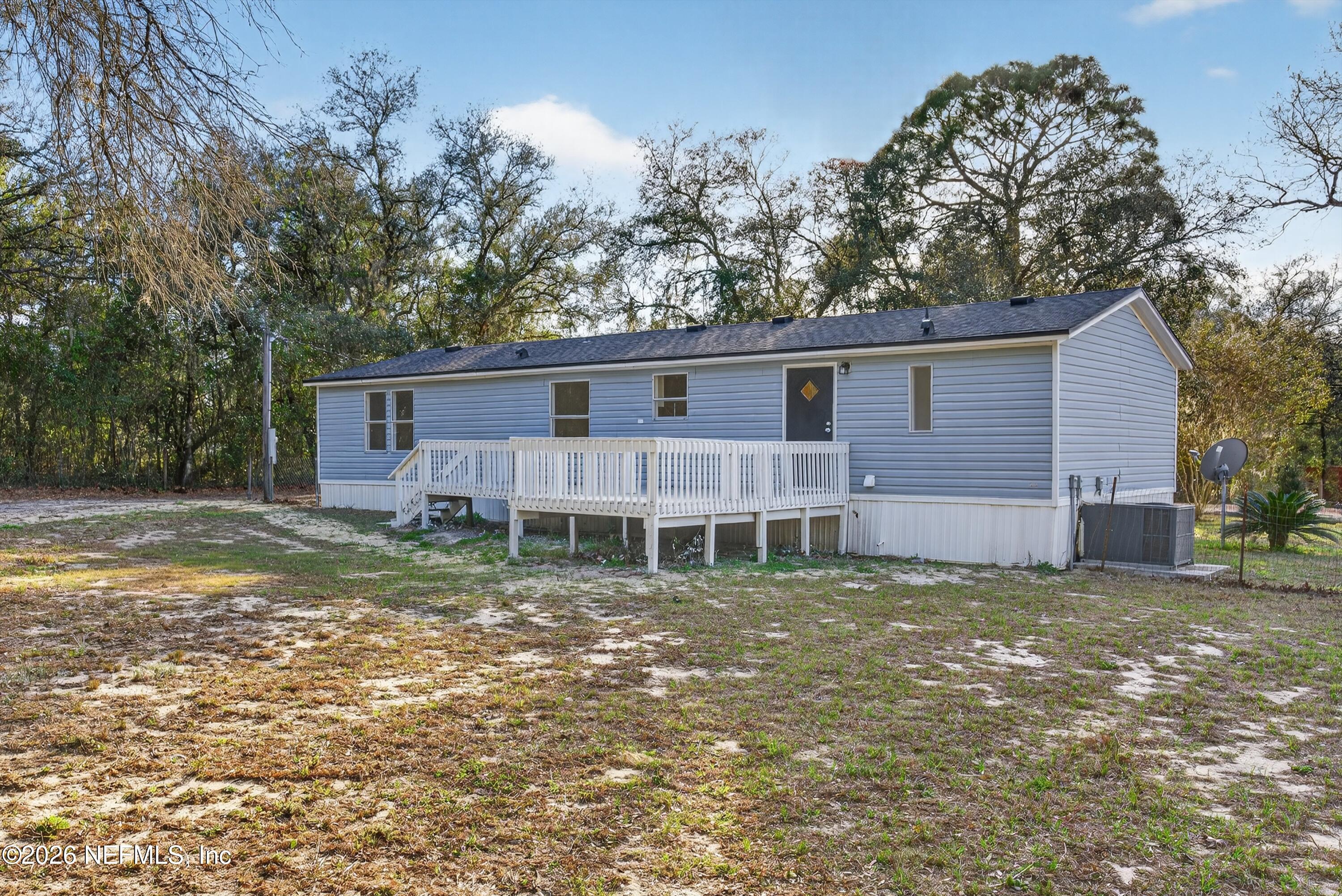 7595 Oak Forest Road Keystone Heights, FL 32656 - Photo 43 of 49 a view of a house with a yard