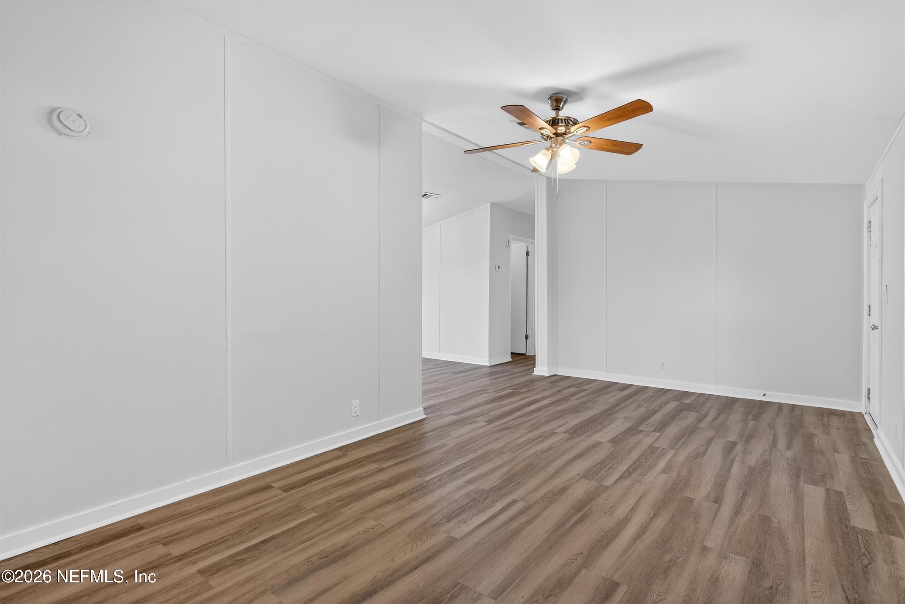 7595 Oak Forest Road Keystone Heights, FL 32656 - Photo 9 of 49 a view of room with wooden floor