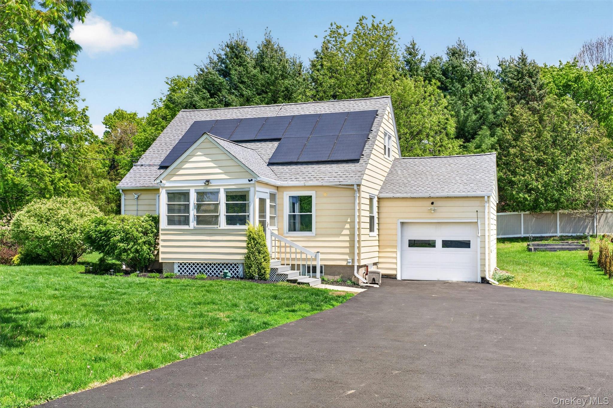 151 Laroe Road Chester, NY 10918 - Photo 1 of 43 a house view with a garden space
