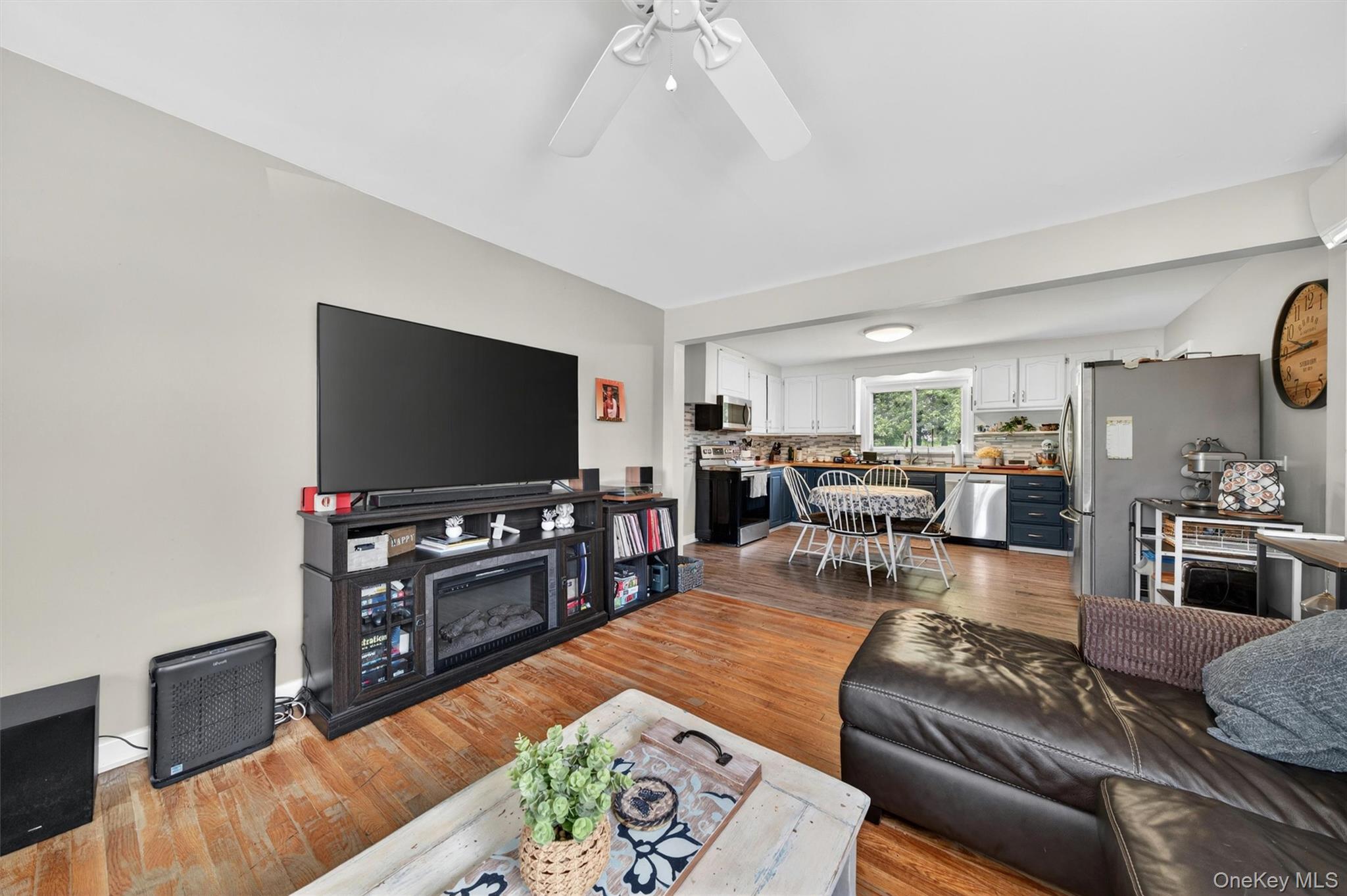 151 Laroe Road Chester, NY 10918 - Photo 13 of 43 a living room with furniture and a flat screen tv