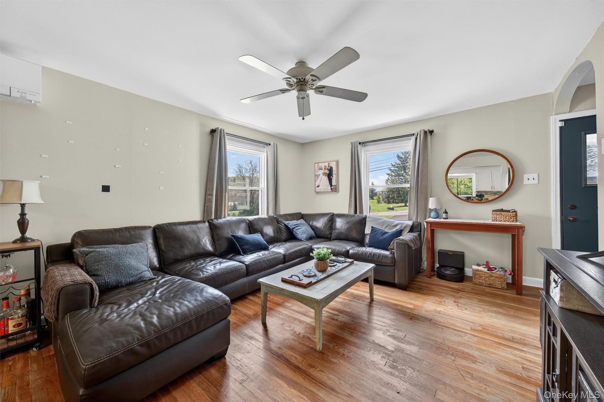 151 Laroe Road Chester, NY 10918 - Photo 14 of 43 a living room with furniture a fireplace and wooden floor