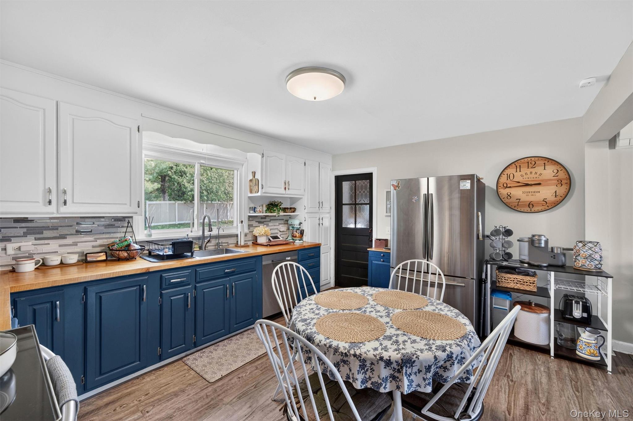 151 Laroe Road Chester, NY 10918 - Photo 19 of 43 a view of a dining room with furniture window and wooden floor