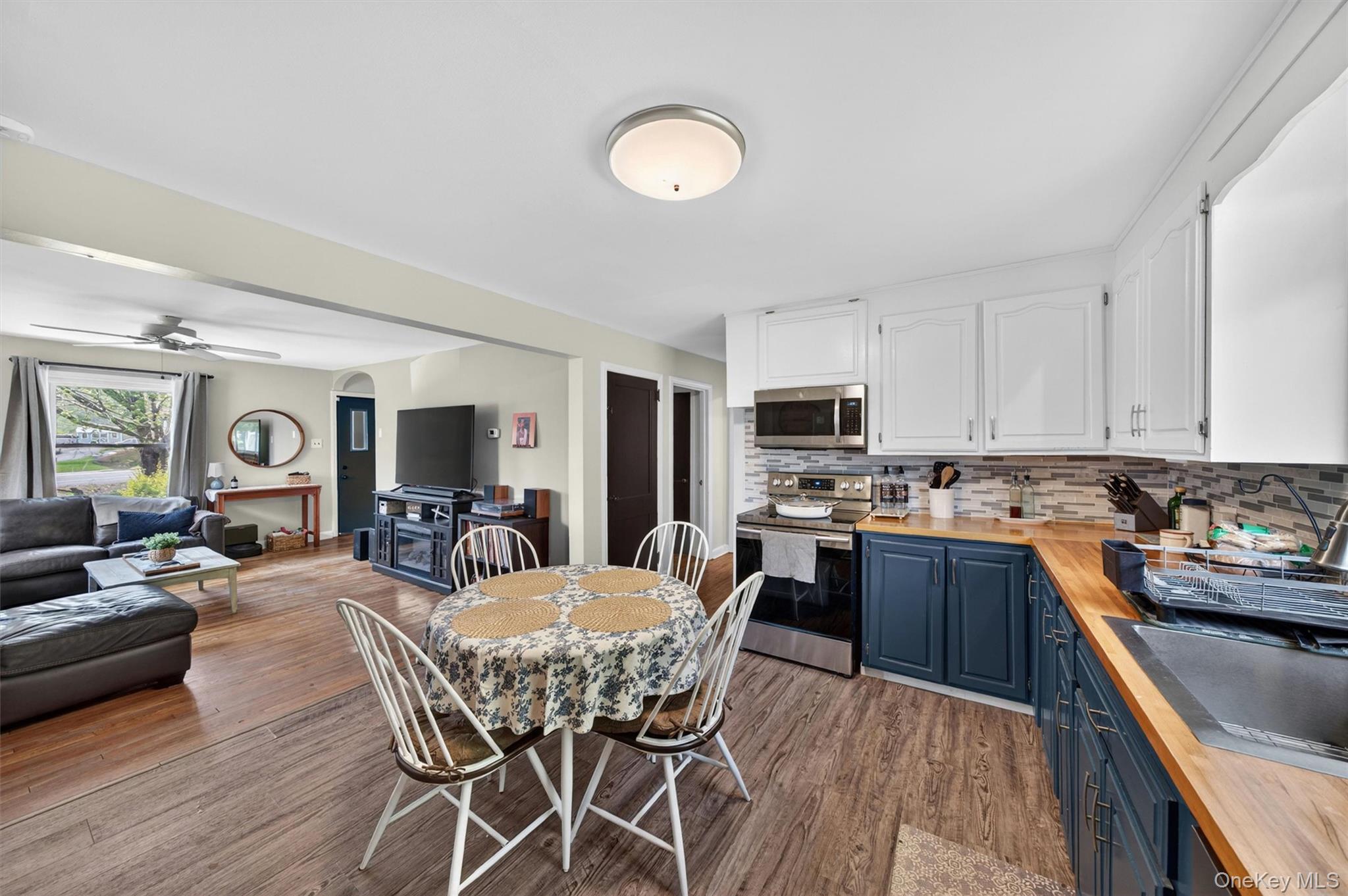 151 Laroe Road Chester, NY 10918 - Photo 21 of 43 a view of a dining room with furniture and wooden floor