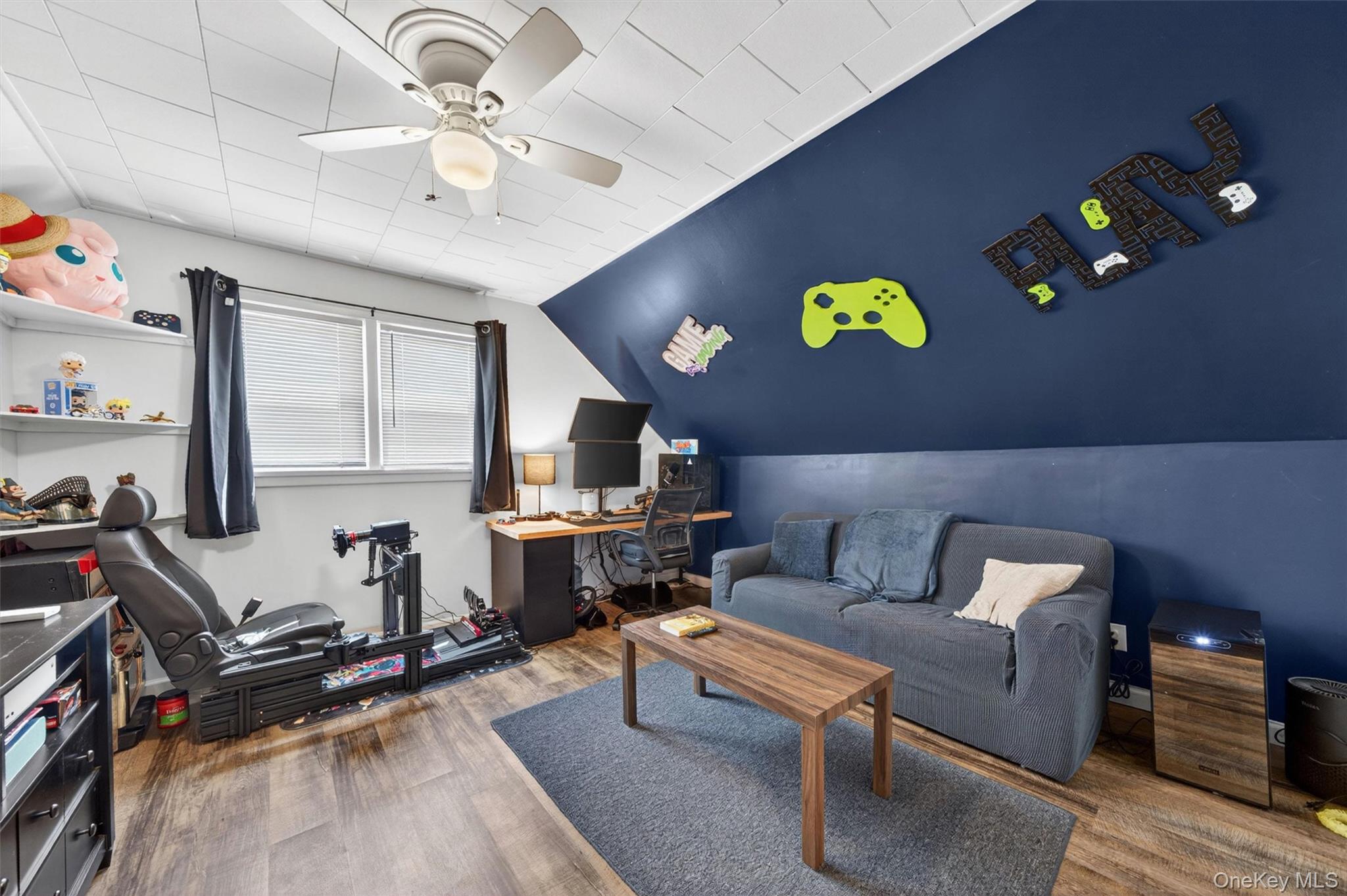 151 Laroe Road Chester, NY 10918 - Photo 31 of 43 a living room with furniture and a flat screen tv with kitchen view