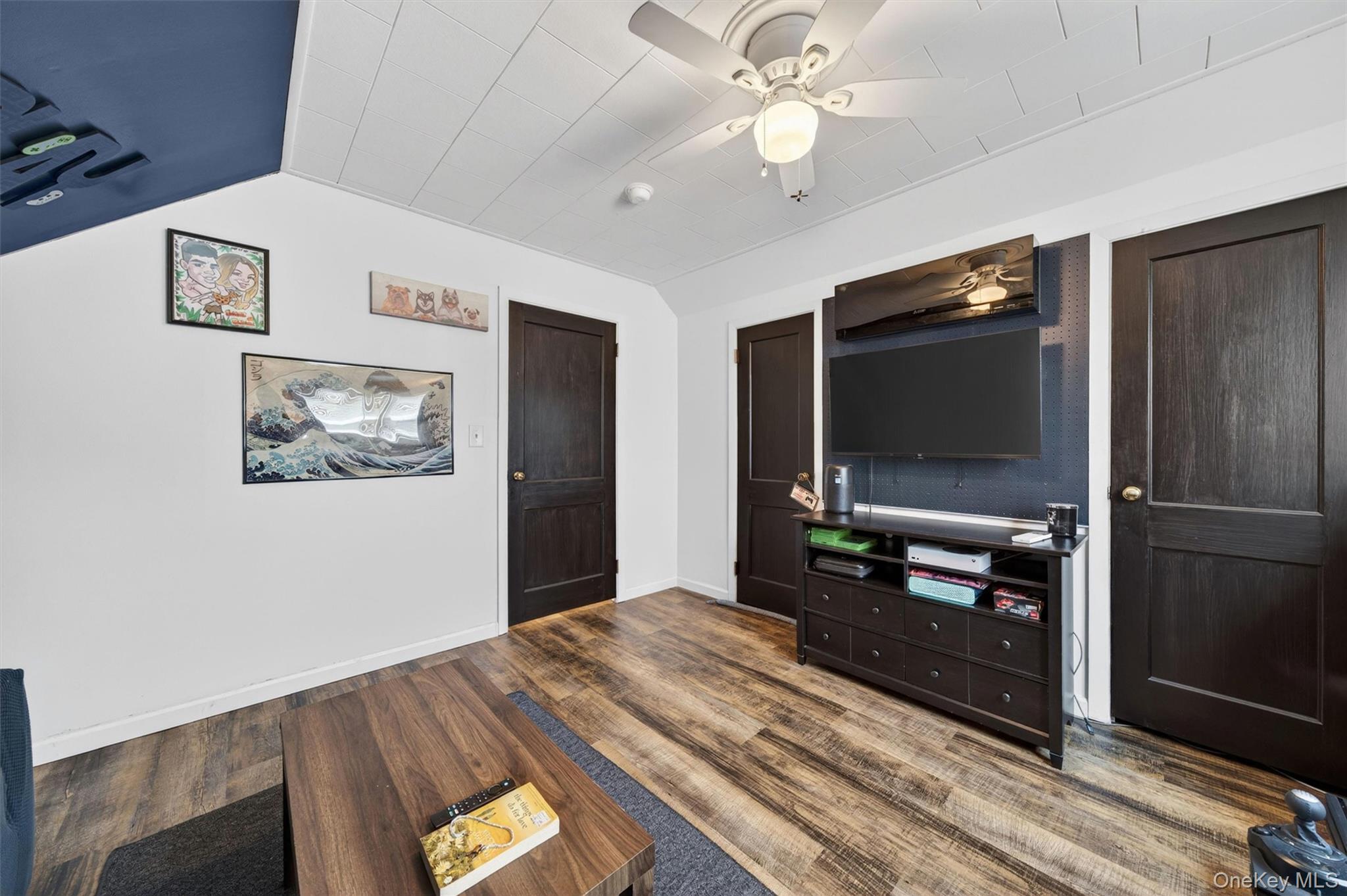 151 Laroe Road Chester, NY 10918 - Photo 32 of 43 a bedroom with a bed and a flat screen tv