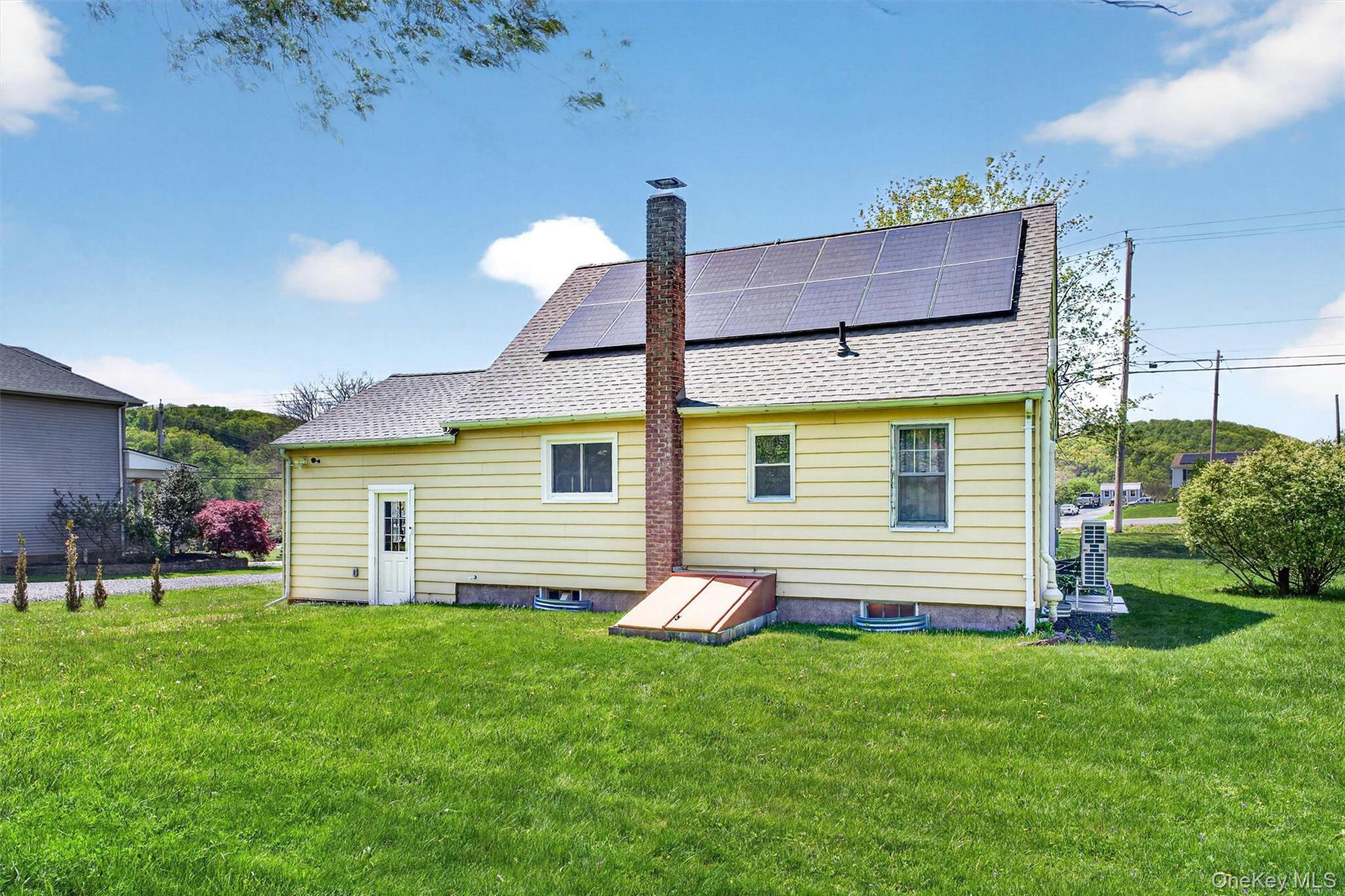 151 Laroe Road Chester, NY 10918 - Photo 41 of 43 a front view of house with yard and green space