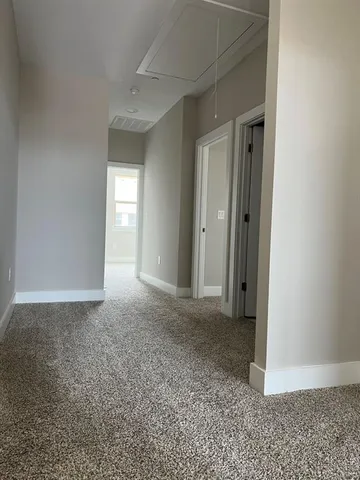 a view of an empty room with window