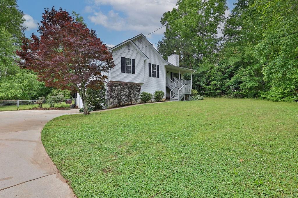 644 Kilough Church Road Dawsonville, GA 30534 - Photo 1 of 1 a view of a house with a yard