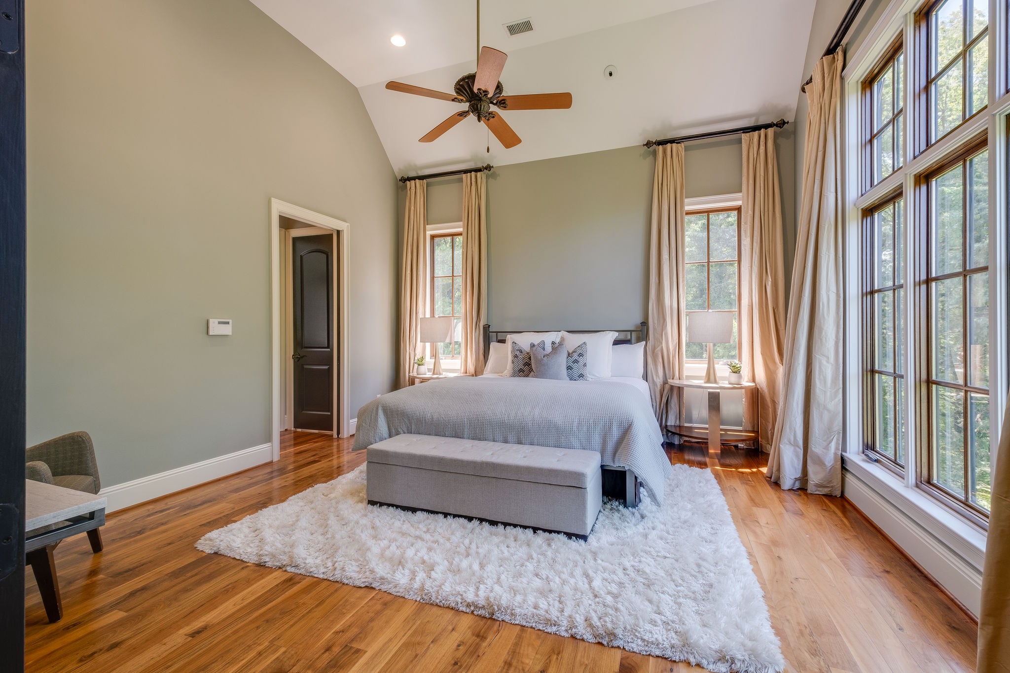 22 Compton Trace Nashville, TN 37215 - Photo 16 of 28 a bedroom with a bed and wooden floor