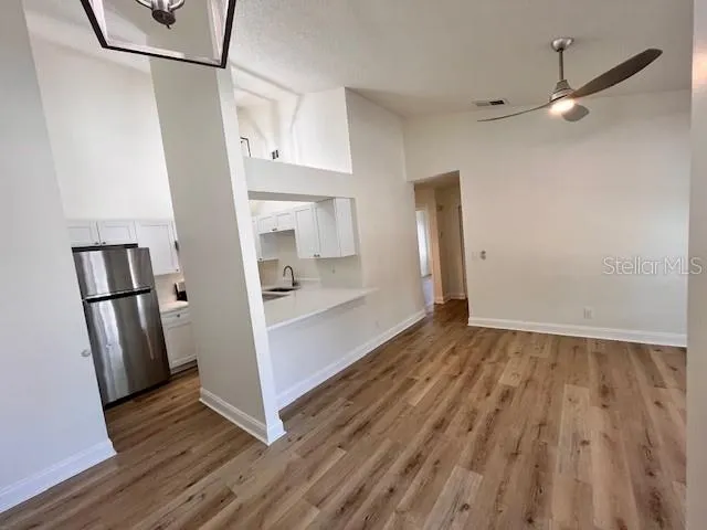 a view of a porch with wooden floor