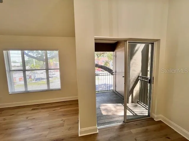 a front view of a house with a yard table and chairs