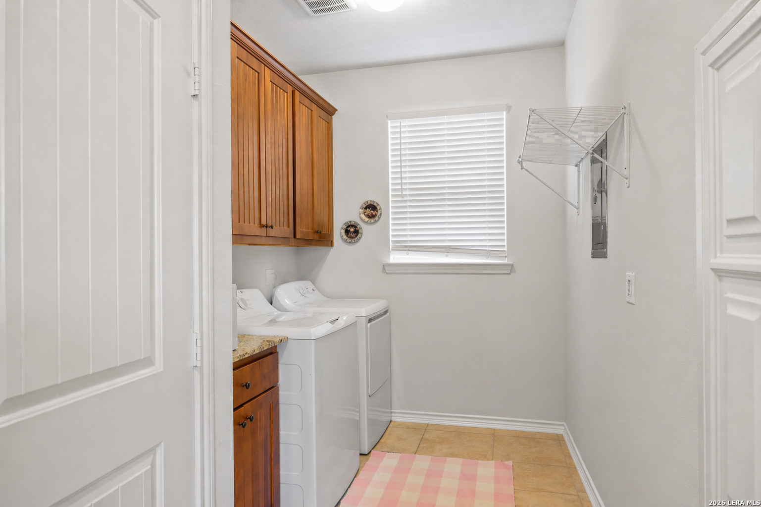 201 Cedar Cliff Loop West Hunt, TX 78024 - Photo 12 of 33 a bathroom with a sink a toilet and a window