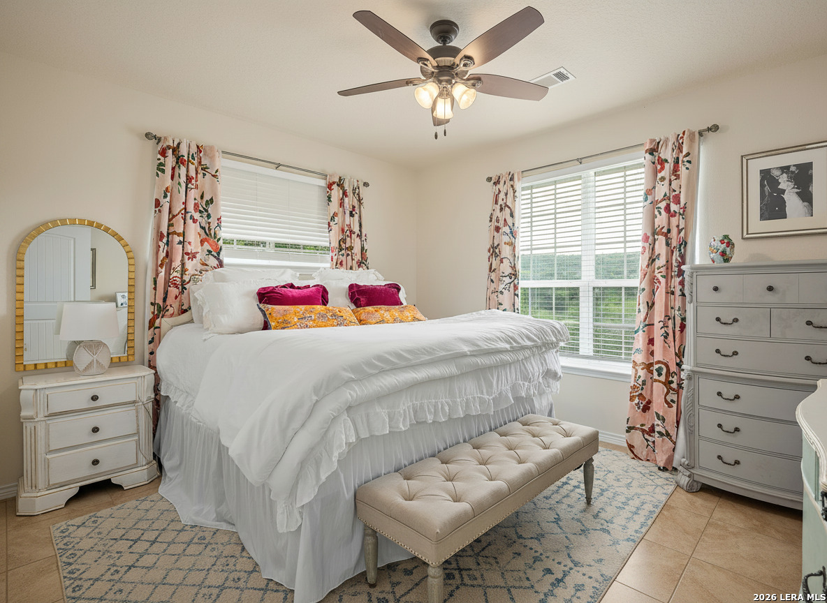 201 Cedar Cliff Loop West Hunt, TX 78024 - Photo 13 of 33 a bedroom with a bed and a dresser