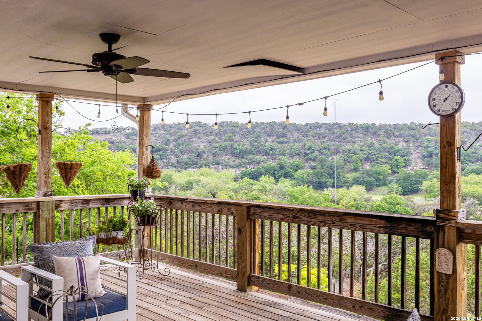 201 Cedar Cliff Loop West Hunt, TX 78024 - Photo 22 of 33 a view of a porch with wooden floor and outdoor seating