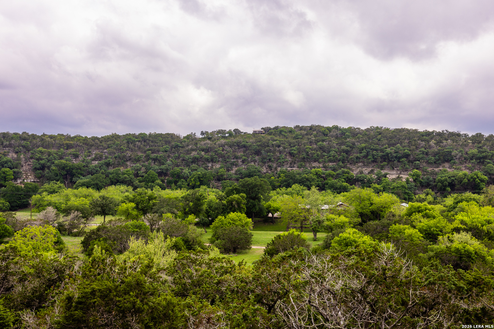 201 Cedar Cliff Loop West Hunt, TX 78024 - Photo 29 of 33 a view of a city with lush green forest
