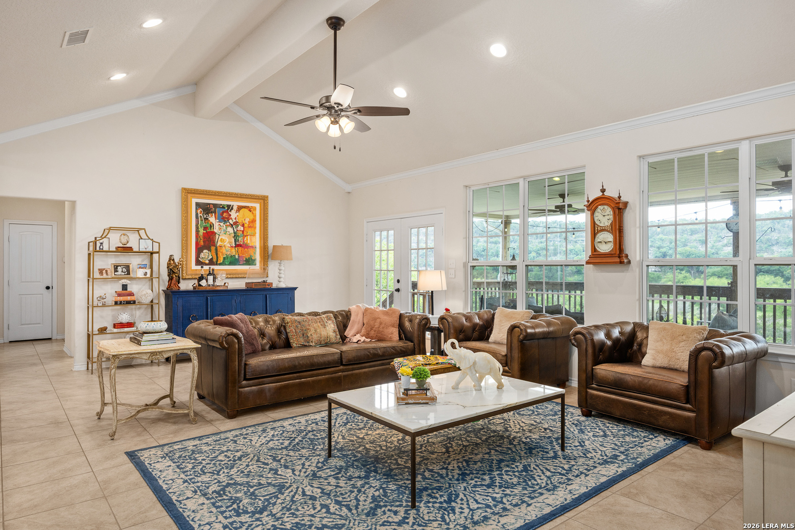 201 Cedar Cliff Loop West Hunt, TX 78024 - Photo 10 of 33 a living room with furniture a large window and a dining table