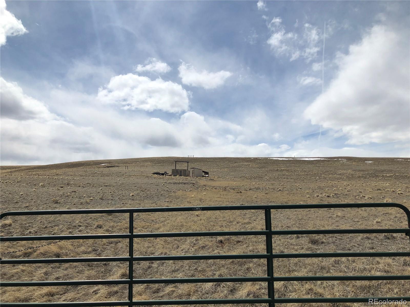 735 Link Road Como, CO 80432 - Photo 9 of 26 a view of a building with sky view