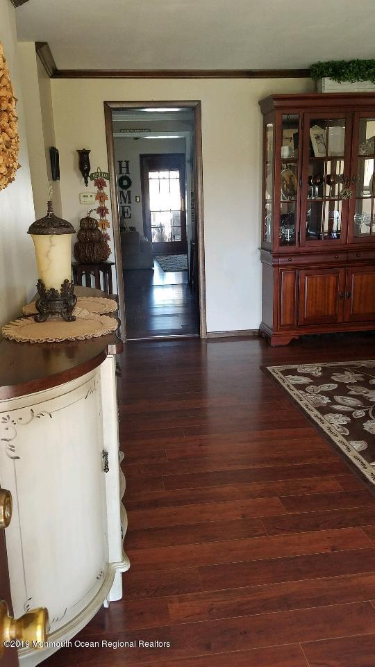 42 Bolton Road Hamilton, NJ 08610 - Photo 5 of 22 a kitchen view of a stove and wooden floor