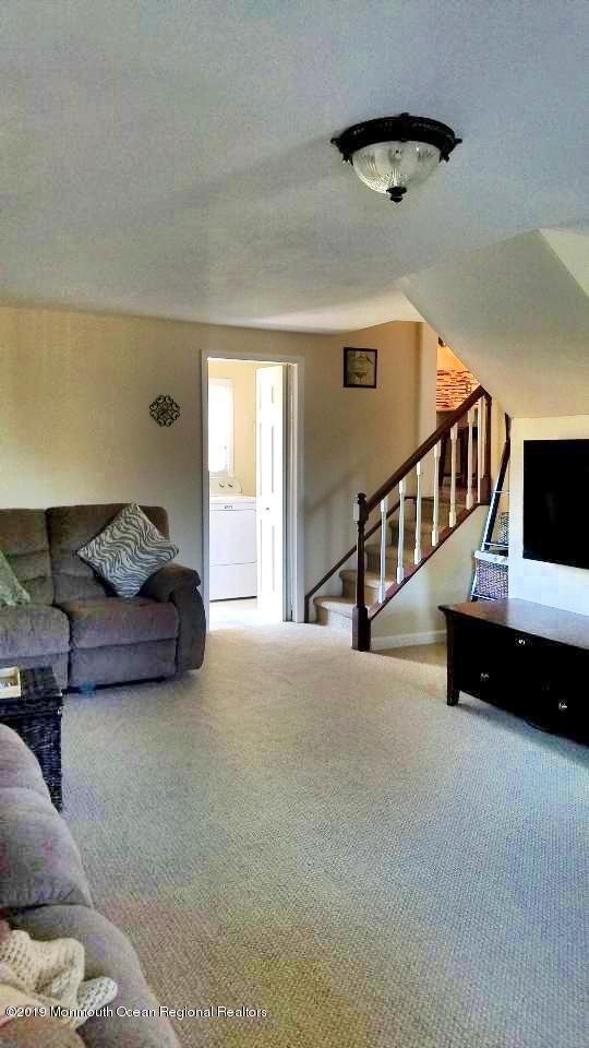 42 Bolton Road Hamilton, NJ 08610 - Photo 10 of 22 a living room with furniture and stairs