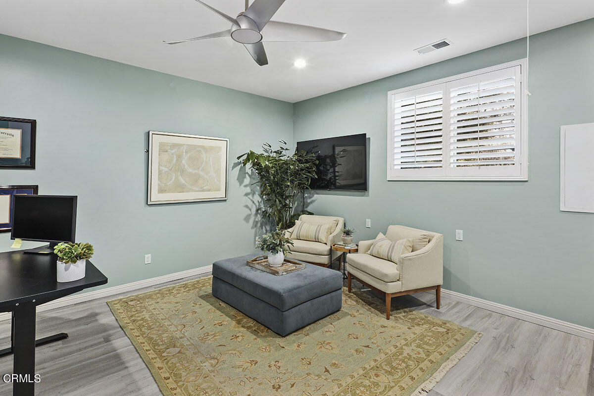 223 Marathon Road Altadena, CA 91001 - Photo 13 of 31 a living room with furniture and a flat screen tv