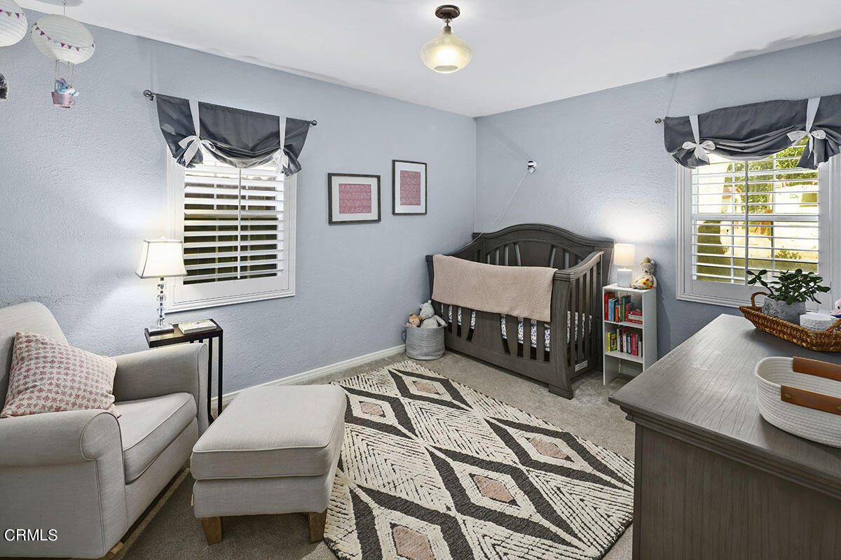 223 Marathon Road Altadena, CA 91001 - Photo 15 of 31 a bedroom with furniture and a window