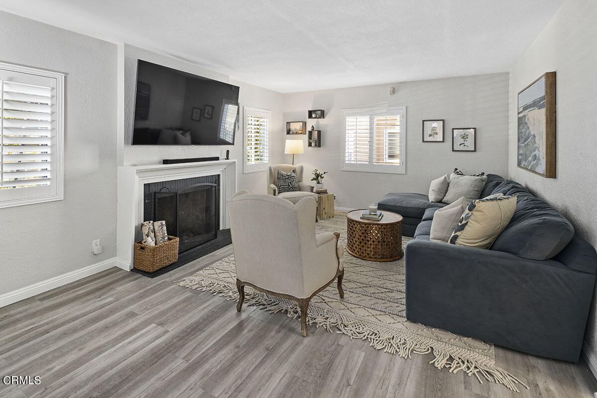 223 Marathon Road Altadena, CA 91001 - Photo 3 of 31 a living room with furniture and a flat screen tv