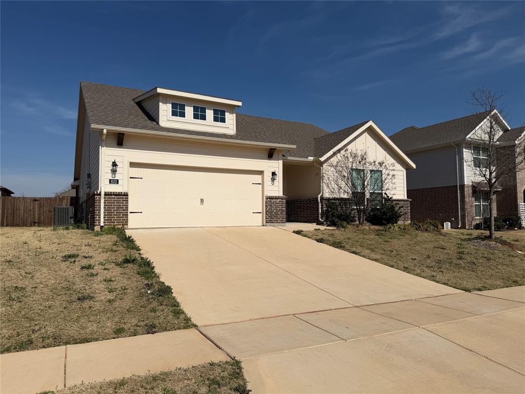 832 Porcupine Drive Springtown, TX 76082 - Photo 2 of 16 a front view of a house with a yard