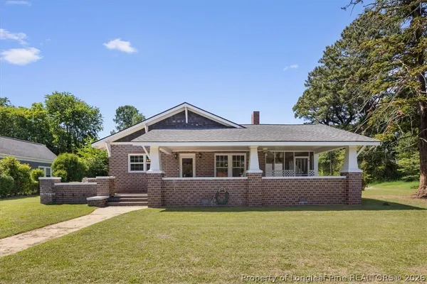 a house view with a garden space
