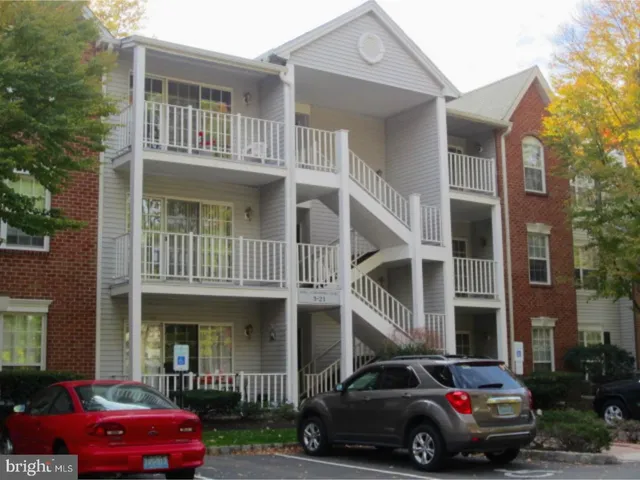 a car parked in front of a house