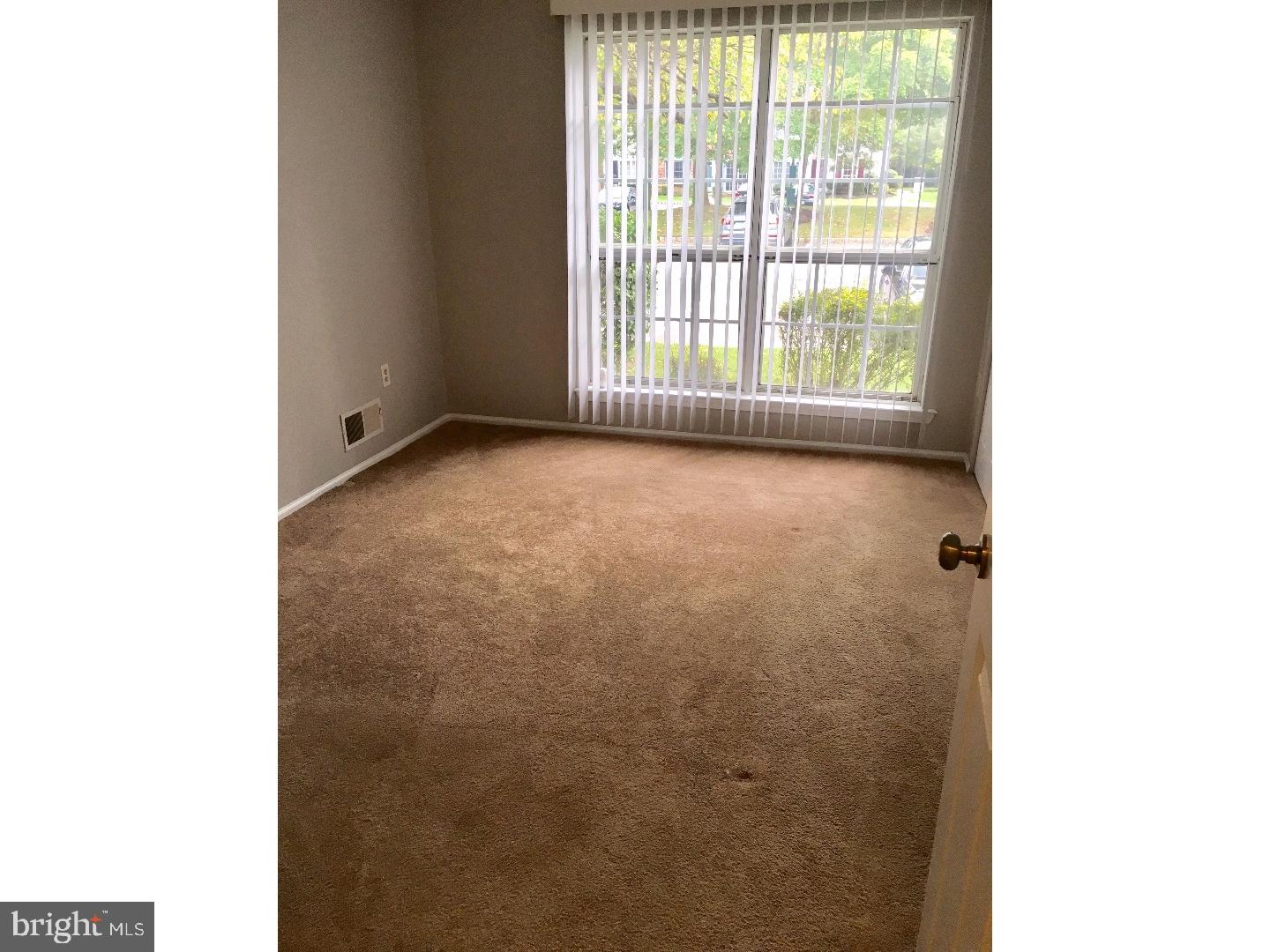 14 Versailles Court Hamilton, NJ 08619 - Photo 13 of 20 a view of an empty room with a window