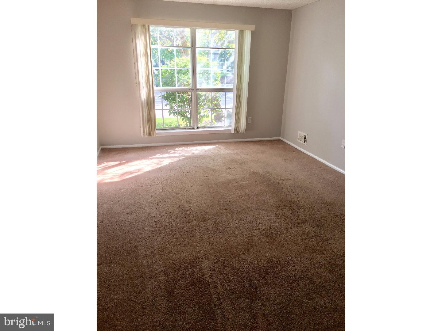 14 Versailles Court Hamilton, NJ 08619 - Photo 16 of 20 a view of an empty room with a window