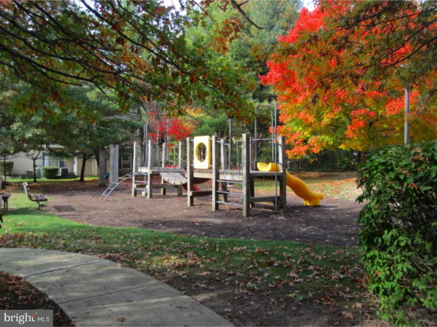 14 Versailles Court Hamilton, NJ 08619 - Photo 18 of 20 a view of a park with large trees