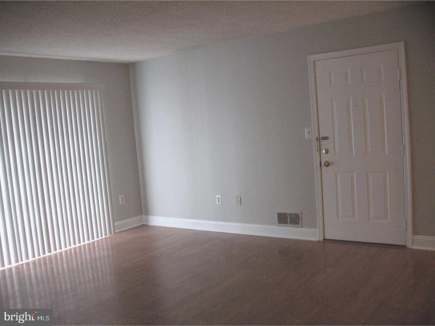 14 Versailles Court Hamilton, NJ 08619 - Photo 7 of 20 an empty room with a window