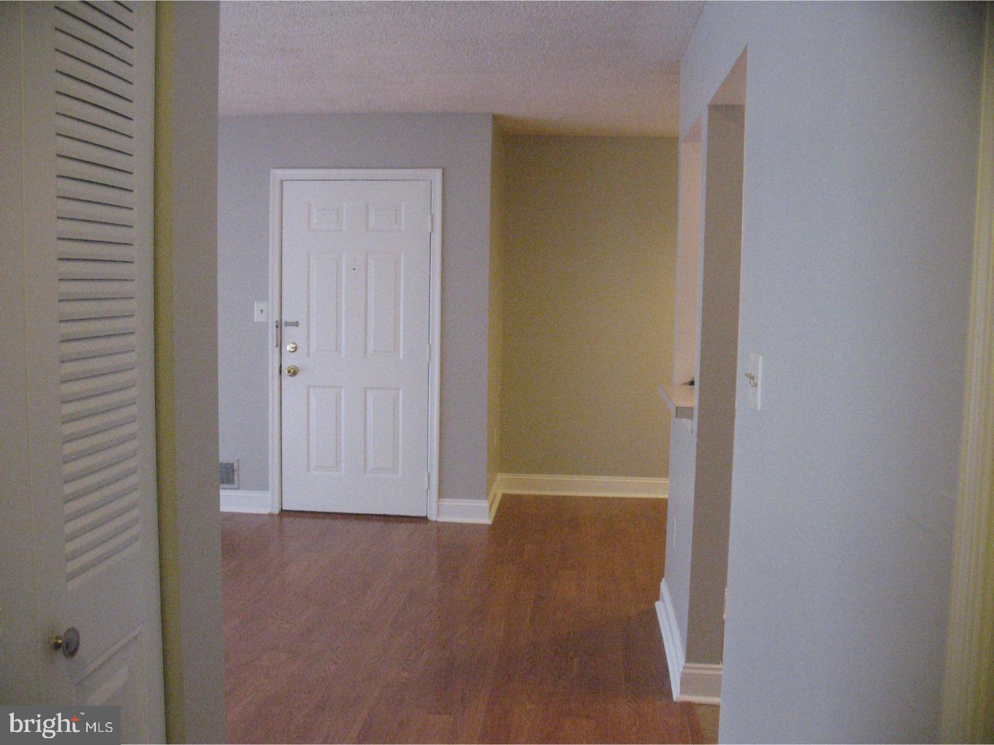 14 Versailles Court Hamilton, NJ 08619 - Photo 8 of 20 a view of empty room with wooden floor