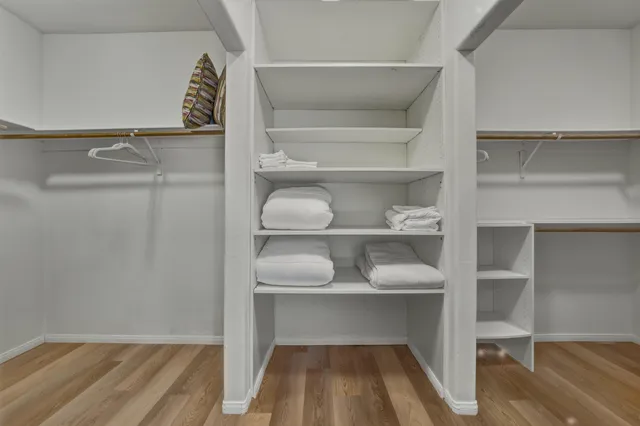 a view of an empty walk in closet