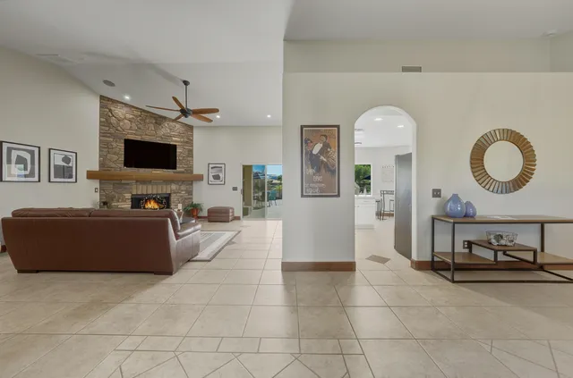 a living room with a couch and a flat screen tv