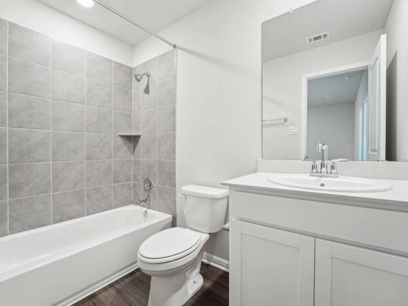 165 Calcite Road, Unit 2 Kyle, TX 78640 - Photo 15 of 17 a bathroom with a sink a toilet and shower