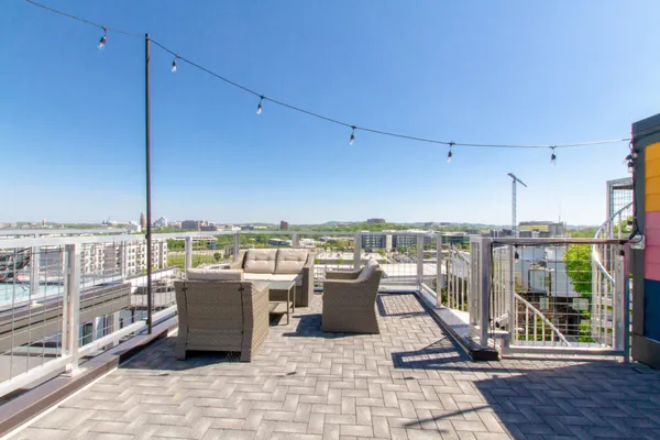 a view of a terrace with seating space
