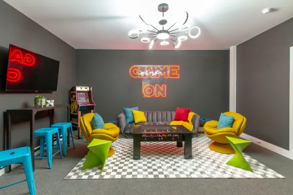 a living room with furniture and a flat screen tv