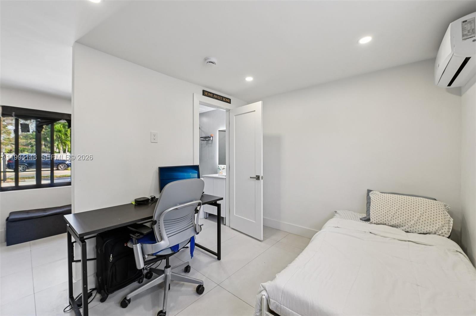 5152 Southwest 6th Street Miami, FL 33134 - Photo 14 of 43 a workspace with furniture and window