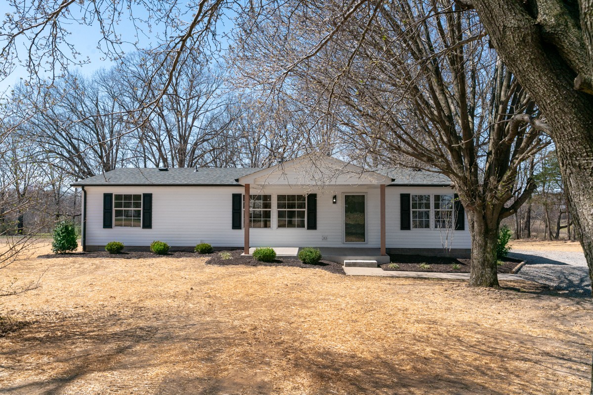 4214 Oregon Road Springfield, TN 37172 - Photo 1 of 37 a front view of house with yard outdoor seating and barbeque oven